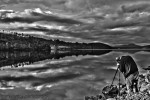 A loch, reflection and clouds, a photograph was born